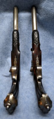 A Pair of Trigger Guards and Lower Forearm Detail