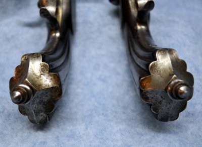 A Brace of Engraved Pistol Grip Caps