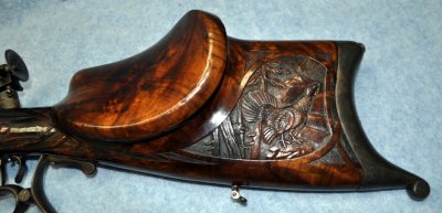 Left buttstock carving