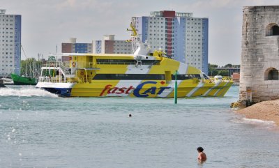 Fast Cat ferry enters Portsmouth harbour.