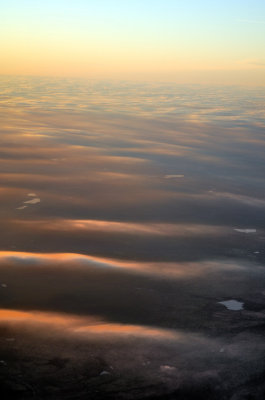 Sunset Over a Sea of Thin Clouds