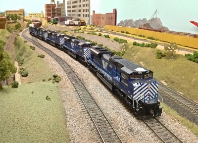MRL 4313 leads a set of SD70ACes round the layout.