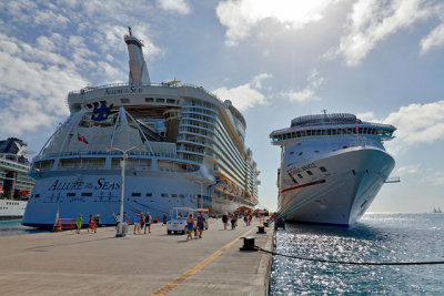 Allure Of The Seas, alongside the Carnival Miracle