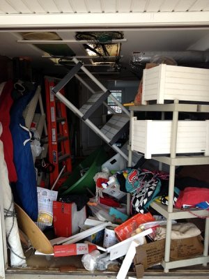 11.  We open the doors to the storage area.