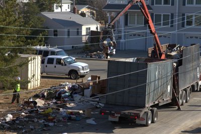 17.  Nick's family possessions begin the trip to the landfill.