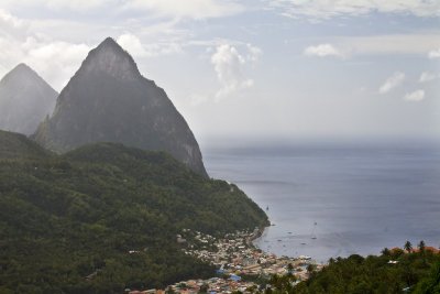 14.  The St. Lucia volcanic spires, the Pitons.  Soufriere village..