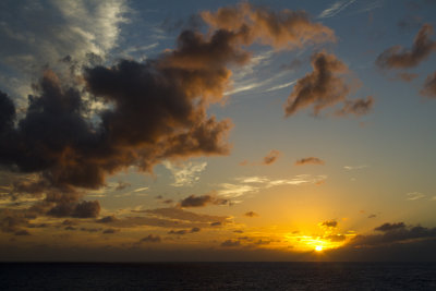 12.  A sunset from our little balcony while cruising south.