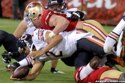 Chicago Bears QB Jason Campbell gets sacked by San Francisco 49ers DE Justin Smith