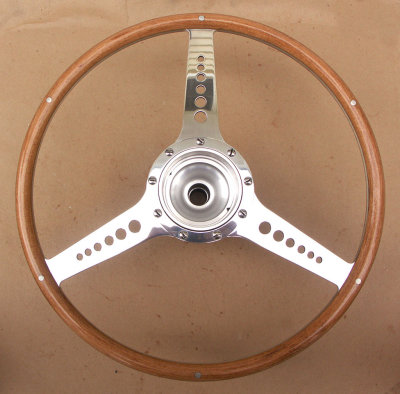 100S - 16  with later style bent spiral rim 