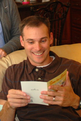 Jon Boy reading a birthday card