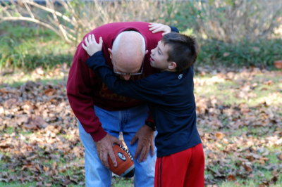 Carter telling Coach the play