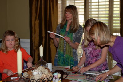 Taylor, Mary Hope, Naomi, and Angie decorating hangers