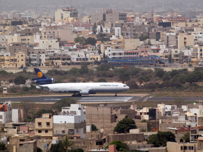 Lufthansa MD-11 cargo prepares to turn around at end of runway