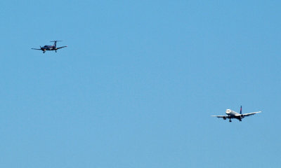 Turboprop and jet on parallel paths for touchdown.jpg