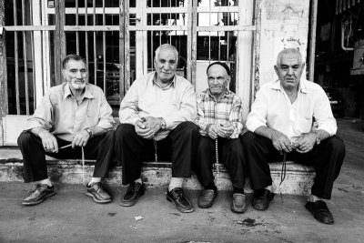 Four men with prayer beads - Tehran