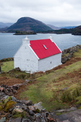  White cottage with red roof