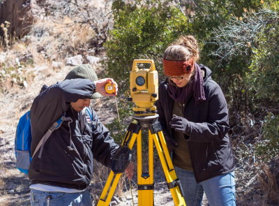 Chris Diaz and Kristin Corl, measuring instrument height