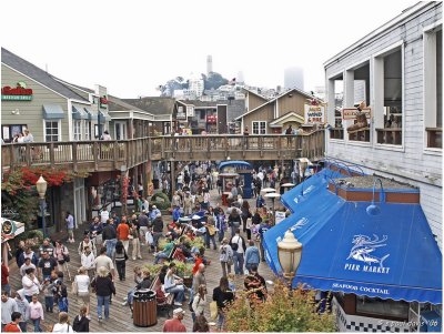 PIER 39 - WITH COIT TOWER IN THE FOG.