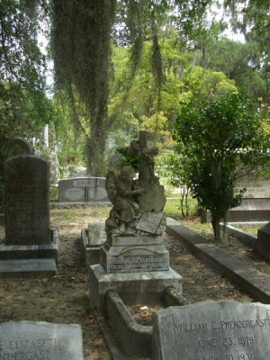 Statues, Headstones, and Moss