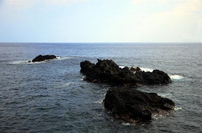 Lava formations in the surf