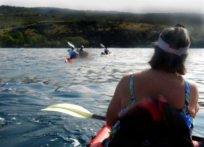 Kayaking along the lava coast to our snorkel site