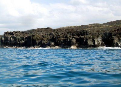 25-Ft lava cliffs and caves along our kayak route