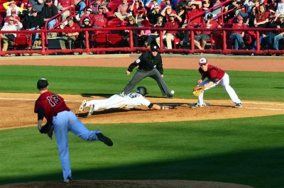 Rosenberg beats the pickoff throw back to the bag