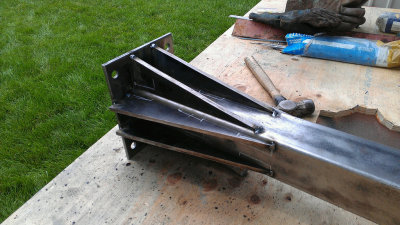 Gussets spot welded (ground end of pier).jpg
