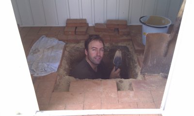 Me digging the pier hole and approaching China.  Body Corporate approval, what?