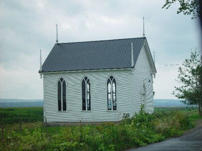 WE FOUND THIS  TINY CHURCH BUILT ON THE DIKE OVERLOOKING THE MEADOWS AND FIELDS LIKE A SENTINEL