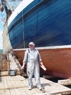 REG AND HIS BOAT-HE WAS SO PROUD