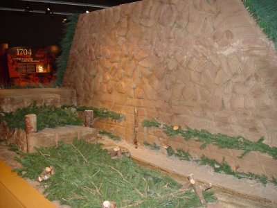 THIS IS A MODEL OF THE DIKES BUILT BY HAND BY THE ACADIANS TO HOLD BACK THE SEA WATER