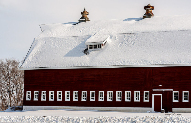 One of the biggest barns I know of and it always looks great in the snow. Notice how the snow has accumulated in the window.
An image may be purchased at http://edward-peterson.artistwebsites.com/featured/window-snow-edward-peterson.html