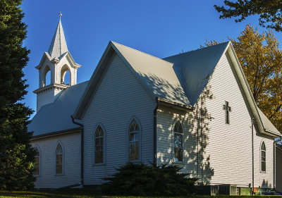 This a shot from the rear of the church which highlights some of the finer points of the structure.
An image may be purchased at http://edward-peterson.artistwebsites.com/featured/1-st-johns-lutheran-church-edward-peterson.html