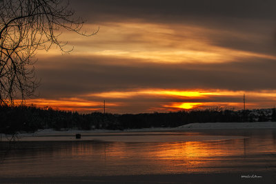 Nothing like a sunset over a frozen lake.
An image may be purchased at http://edward-peterson.artistwebsites.com/featured/snow-ice-and-sunset-edward-peterson.html