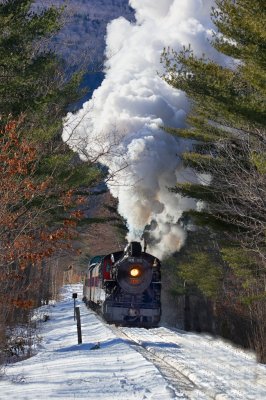 The 7470 steam engine in the whitw mountains of NH.