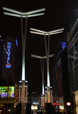 Illuminated poles on the Wiech's Passage in Warsaw