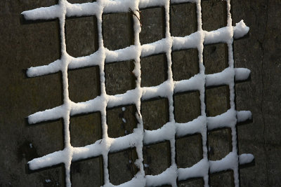 Snowy abstract II - Wooden grate under the snow