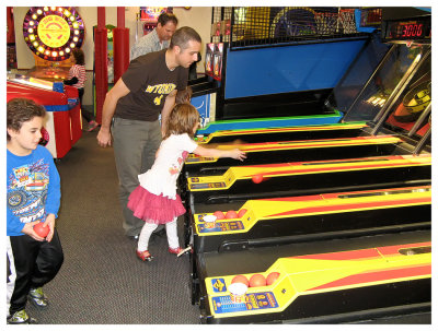 Trying her hand at skee ball