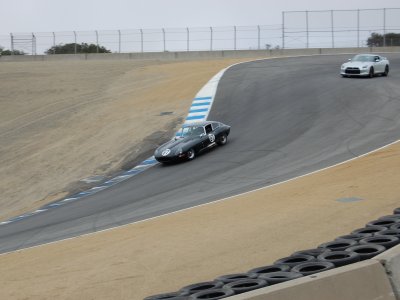 Jaguar XKE and Nissan GTR in Laguna Seca corkscrew