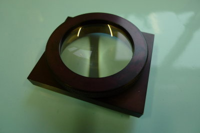 Lens and holder