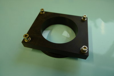 Lens and holder