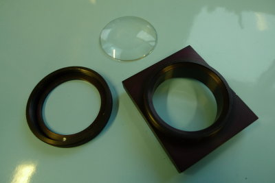 Lens and holder