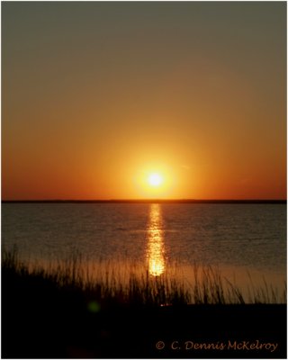 Full sun over bay - Bryan Beach