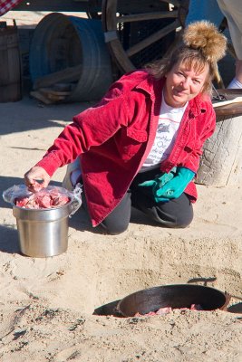Linda prepares lunch in Dutch Ovens