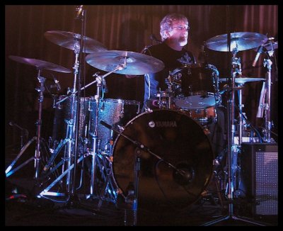 Tommy Brechtlein on drums