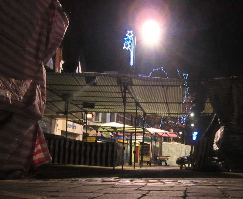 Market  stalls  awaiting  the  morning.