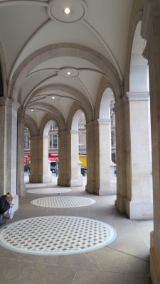 Underneath the arches.
