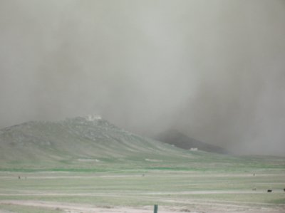 Sandstorm covering hilltops