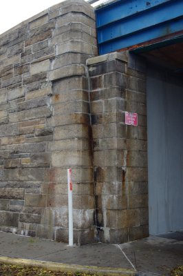 Waves washed as high as the second stone above that sign